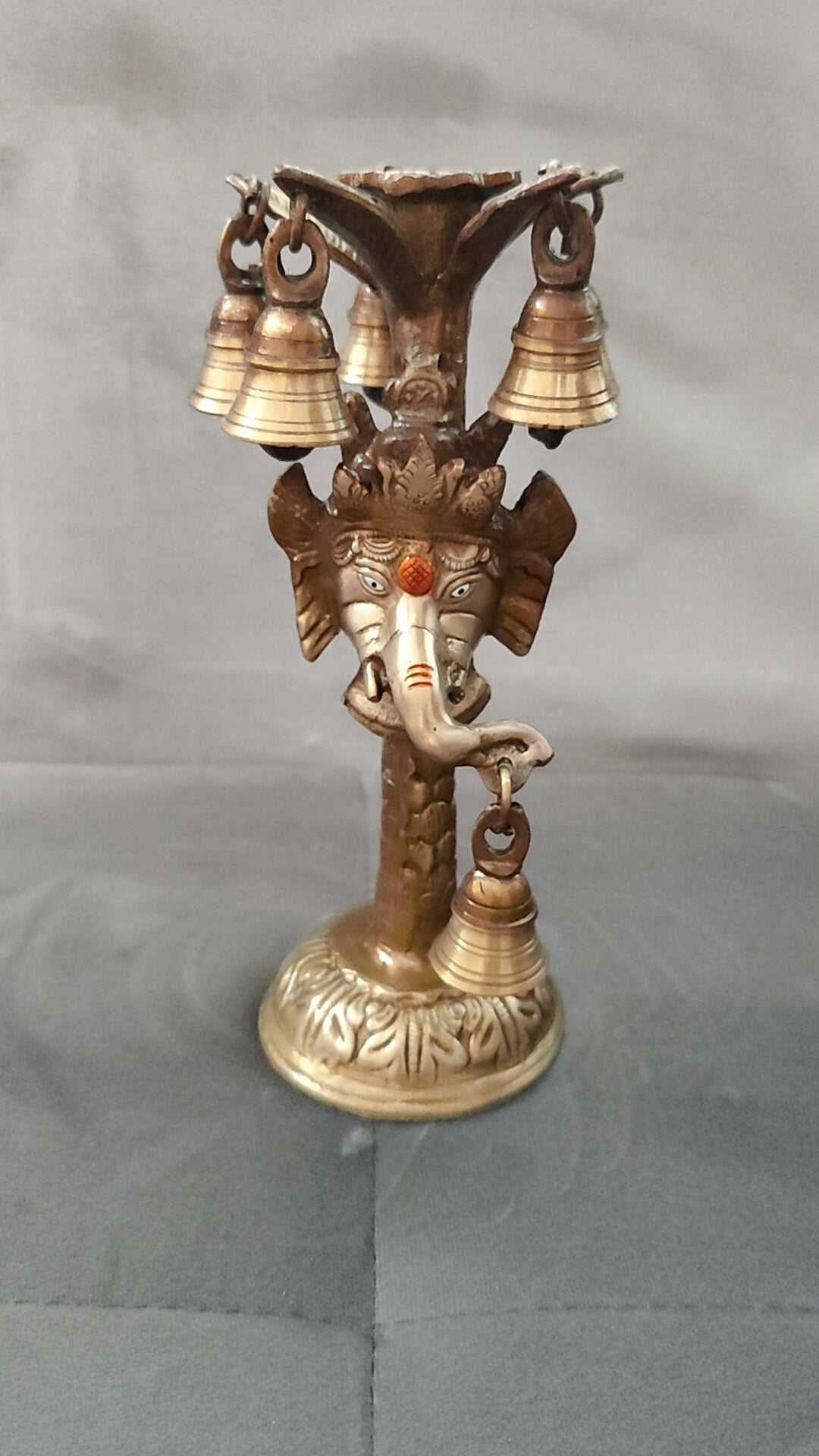 Ganesh candle stand with bells 10"