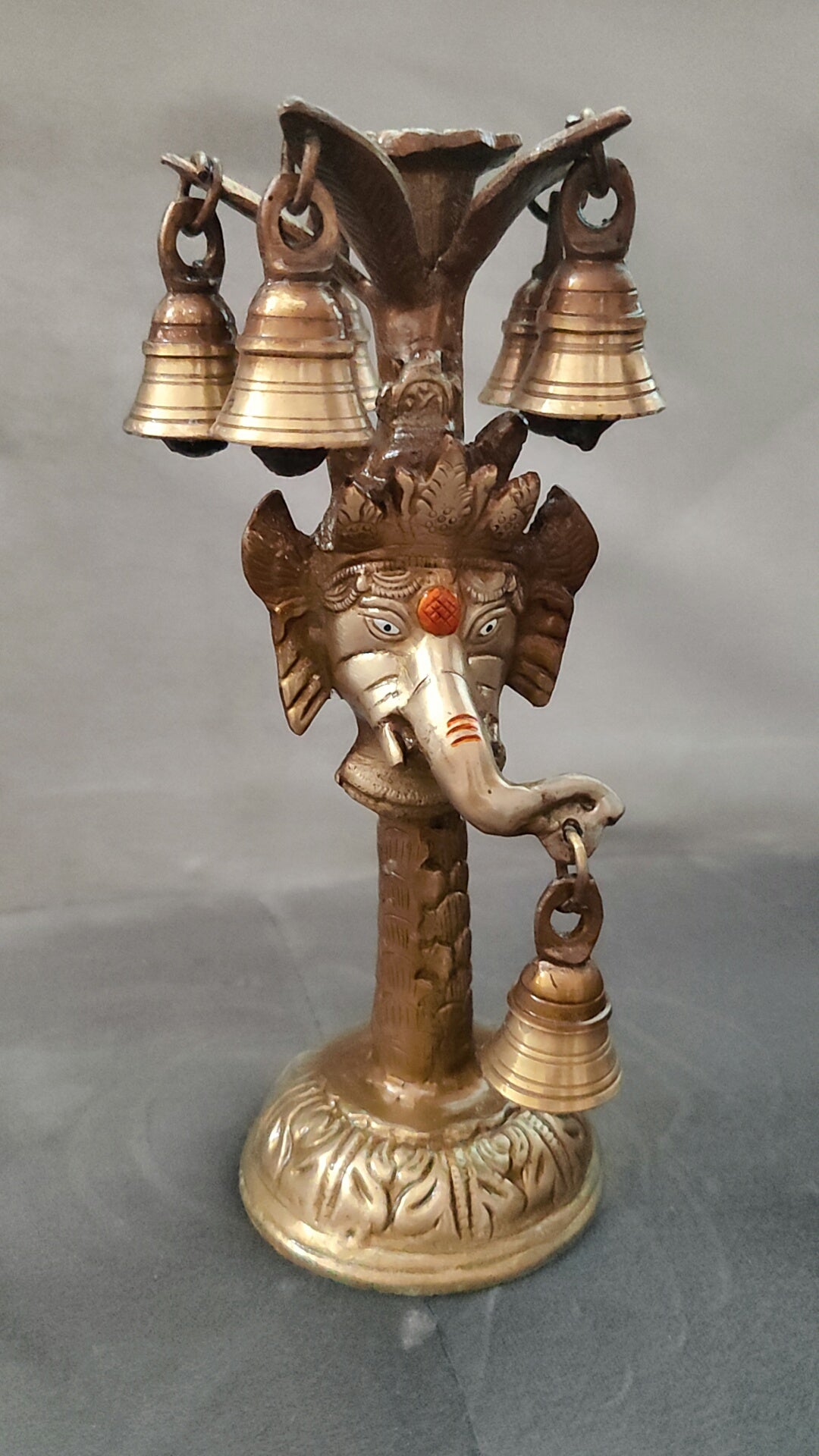 Ganesh candle stand with bells 10"